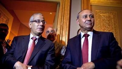 Dr Ali Zidan, the prime minister of Libya, left, and his foreign minister, Mohamed Abdelaziz, prepare to greet members of the UAE Libyan expatriate community at Emirates Palace hotel in Abu Dhabi. Both said they hoped Libya could learn from the UAE's expertise in security issues.