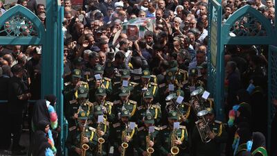 Iranians carry the coffin of Islamic Revolutionary Guard Corps member Mahan Setareh, who was killed in a recent Israeli air strike, in Tehran. EPA