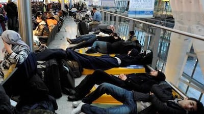 As snow and ice continue to wreak havoc across Europe and calls mount for better weather preparedness, relief is not forecast to arrive until after the holiday. Above, passengers sleep on makeshift beds in Terminal 5 at Heathrow Airport in London yesterday.