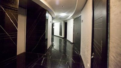 The curved corridor in the world's tallest 'twisted tower', Cayan Tower in the Dubai Marina. Razan Alzayani / The National