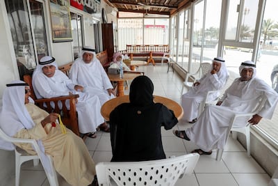 Senior Emirati men meet in Sharjah's 'elderly majlis' every weekday where they play board games and catch up on news. Chris Whiteoak / The National