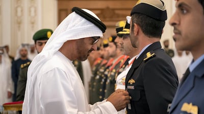 Sheikh Mohamed bin Zayed presents an Emirates Military Medals to members of the UAE Armed Forces, Ministry of Interior and Abu Dhabi Police during a Sea Palace barza.