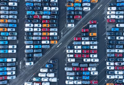 Recently imported brand new unregistered cars, mainly electric vehicles made by the Chinese company MG, are parked in a storage yard as they wait delivery to car dealerships at the Port of Bristol. Getty Images