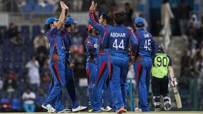 Afghanistan celebrate a score against Ireland on Saturday at the Desert T20 Cricket Tournament at Zayed Cricket Stadium in Abu Dhabi on Saturday, January 14, 2017. Ruel Pableo for The National