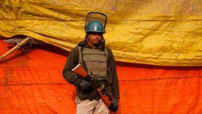An Indian paramilitary soldier stands guard in Srinagar, Kashmir. Farooq Khan / EPA