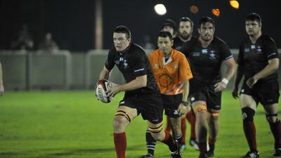 Dubai Exiles, in black, of the UAE Premiership, will host Muscat on Friday in a West Asia Championship match. Grant Winter for The National