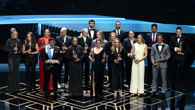 LONDON, ENGLAND - JANUARY 15: Lauren James, Aitana Bonmati, Keira Walsh, Ella Toone, Alessia Russo, Lucy Bronze, Alex Greenwood, Olga Carmona and Mary Earps, Members of the Fifpro Women's World XI, FIFA Men's Coach of the Year, Pep Guardiola, FIFA Women's Coach of the Year, Sarina Wiegman, FIFA Fan Award Winner, Hugo Daniel Iniguez, 2023 Fifpro Men's Best XI Members, Ruben Dias and Kyle Walker and Puskas Award Winner, Guilherme Madruga, stand on stage with their awards during the The Best FIFA Football Awards 2023 at The Apollo Theatre on January 15, 2024 in London, England. (Photo by Kate Green / FIFA via Getty Images)
