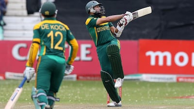 Hashim Amla, right, and Quinton de Kock both scored centuries during their 194-run partnership for the first wicket in Durban on Sunday. Anesh Debiky / AFP