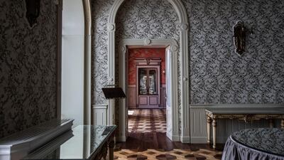 An empty restaurant hallway of the historical Grand Hotel Tremezzo, in Tremezzo, on Como Lake, Italy. The hotel will open in June. AP Photo / Luca Bruno