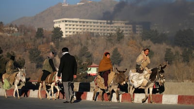 Smoke rises from the Intercontinental Hotel during an attack in Kabul, Afghanistan. Mohammad Ismail / Reuters