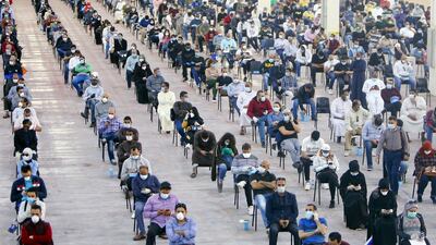 Expatriates returning from Egypt, Syria, and Lebanon arrive to be re-tested at a Kuwaiti health ministry containment and screening zone for Covid-19. AFP
