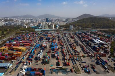 Shipping containers sit stacked in this aerial photograph taken in Uiwang, South Korea, on Wednesday. Bloomberg