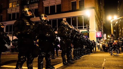 Police confront protesters in Portland, Oregon on November 4, 2020 during a demonstration called by the Black Lives Matter movement. AFP