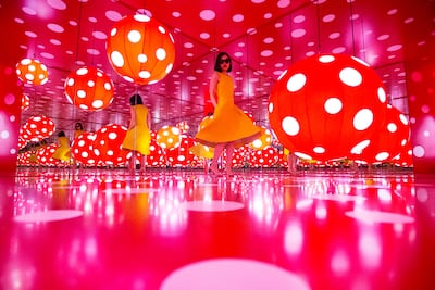 Inside the Dot Obsessions installation by Japanese artist Yayoi Kusama, shown by the Sharjah Art Foundation in 2017. Christopher Pike / The National