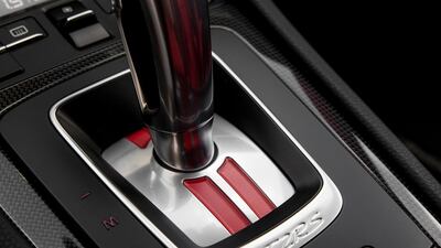 A single button will disengage both the electronic stability control and traction control. Porsche