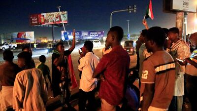 Civilians gather near the area where gunmen opened fire outside buildings used by Sudan's National Intelligence and Security Service (NISS) in Khartoum, Sudan January 14, 2020. Reuters