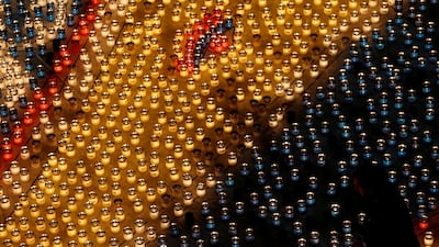 A visitor looks at a display of candles during the Festival of Lights Cittadella, in the medieval citadel in Victoria, on the island of Gozo, Malta. Reuters