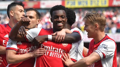 Eddie Nketiah, centre, of Arsenal celebrates after scoring the opening goal against Leeds United on Sunday, May 8, 2022. EPA