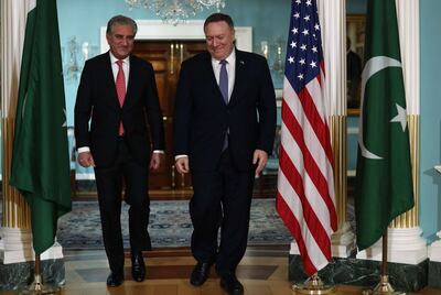 US Secretary of State Mike Pompeo welcomes Pakistani Foreign Minister Shah Mehmood Qureshi to the State Department on Friday. AFP