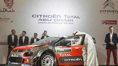 Abu Dhabi Racing chairman Sheikh Khalid Al Qassimi and Mubadala managing director Khaldoon Al Mubarak take a closer look at the Citroen Total Abu Dhabi World Rally Team’s new Citroen CR3 WRC, which will compete in the 2017 World Rally Championship series with drivers Sheikh Khalid and Kris Meeke. Antonie Robertson / The National