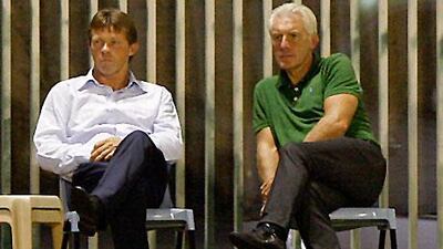 Franky Vercauteren, left, and his assistant head coach, Hugo Broos, watch their team practise ahead of the Super Cup.