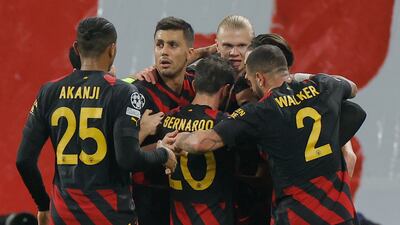 Riyad Mahrez and teammates celebrate taking the lead. AFP