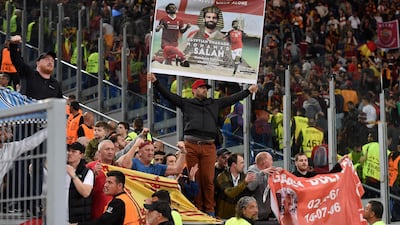 Liverpool fans celebrate at the Olympic Stadium in Rome. Paul Ellis / AFP
