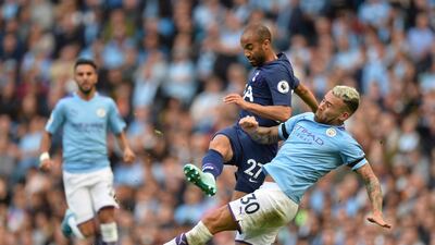 Manchester City's Nicolas Otamendi (R) in action against Tottenham Hotspurs Lucas Moura (C) during the English Premier League soccer match between Manchester City and Tottenham Hotspurs at the Etihad Stadium in Manchester, Britain. EPA