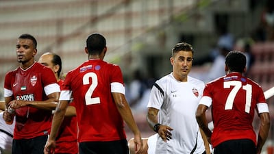 Al Ahli assistant Fabio Cannavaro, second right, shown during a friendly prior to the 2013/14 Arabian Gulf League season. Satish Kumar / The National / August 4, 2013