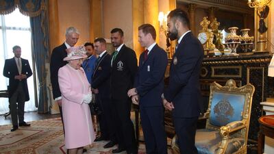 The Queen chats to some of the captains. AFP