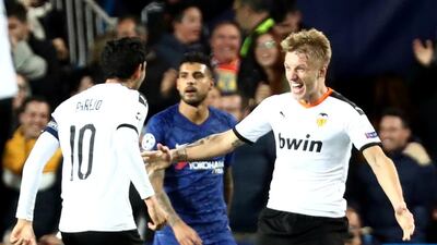 Valencia's Daniel Wass, right, celebrates scoring their second goal. Reuters