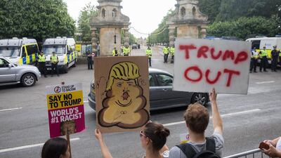 Protesters gather at the gates of Blenheim Palace. Getty Images