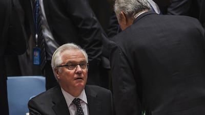 Syria’s UN Ambassador Bashar Jaafari, right, speaks to Russia’s UN ambassador Vitaly Churkin during a meeting of the United Nations Security Council on Thursday. Lucas Jackson / Reuters / May 22, 2014