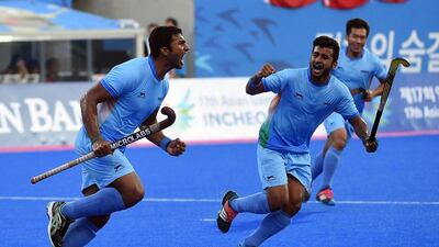 Raghunath Vokkaliga Ramchandra of India celebrates a goal during the group round at the Asian Games on Saturday in Incheon, South Korea. India advanced to the final on Tuesday. Prakash Singh / AFP / September 27, 2014