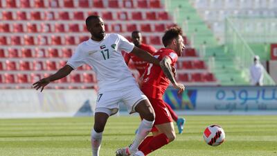 Shabab Al Ahli forward Federico Cartabia, right, is challenged by Emirates defender Salem Aleedi. Photo: PLC