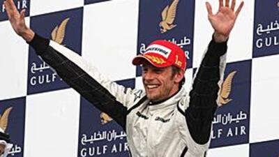 Jenson Button, pictured after winning the 2009 Bahrain Grand Prix with Brawn GP, will line up on the grid for the 2010 race for McLaren.