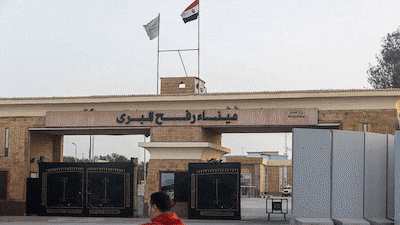 Trucks carrying aid enters the Rafah border between Egypt and Gaza. Getty Images