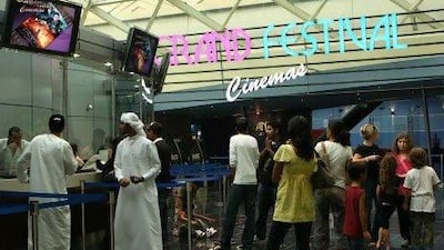 The government-owned Qatar Media Services has bought a stake in Gulf Film, which incorporates a film-distribution company and Grand Cinemas, the region's leading cinema chain. Paulo Vecina/The National