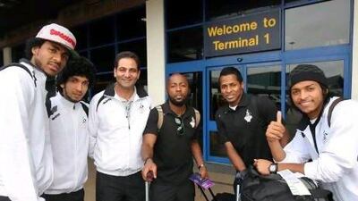 Ismail Matar, centre, and other members of the UAE Olympic football team arrived at Manchester Airport.