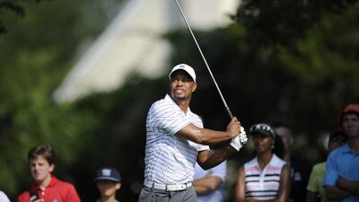 By constantly re-working his swing to improve his game, Tiger Woods may have made things worse. Nick Wass / AP Photo