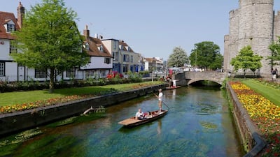 Punting along the Great Stour River through Westgate Gardens in Canterbury, which is famed for its cathedral. Adam Batterbee