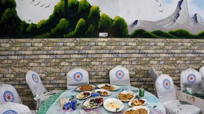 The remains of food is seen on the table of a damaged wedding hall after a blast in Kabul, Afghanistan. Reuters