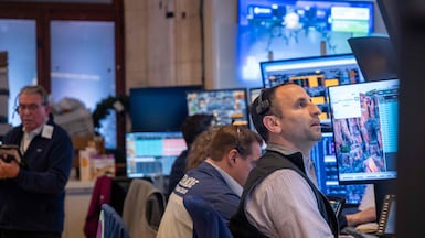 Traders work in the New York Stock Exchange. US tech is still at the heart of the bull market run. Getty Images