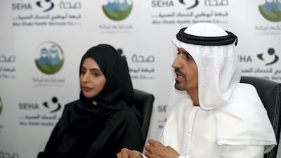Yousef Al Kitbi, acting chief operating officer at Tawam Hospital, speaks during a press conference announcing a new health scheme to support patients aged 60 and over in Abu Dhabi. Chris Whiteoak / The National