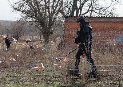 A Ukrainian sapper takes part in a demining operation in the Kharkiv area on March 12.EPA