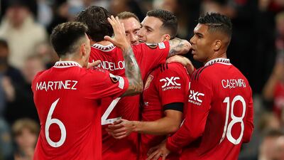 Diogo Dalot of Manchester United celebrates with teammates after scoring the first goal. Getty