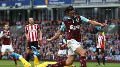 Vito Mannone of Sunderland dives to make a save at the feet of George Boyd of Burnley during their Premier League draw on Saturday. Chris Brunskill / Getty Images