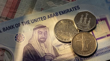 STOCK PHOTOGRAPHY Money stock of United Arab Emirates Dirham, AED, notes for Business, Currency, Gold price, Finance. United States Economy. Antonie Robertson/The National