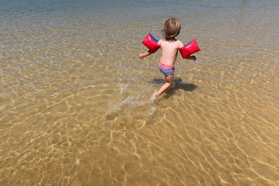 Beachgoers are encouraged to familiarise themselves with water conditions, warning flags and designated swimming areas. Getty Images