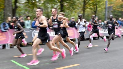 Kenya's Eliud Kipchoge (white jersey) runs during his attempt to bust the mythical two-hour barrier for the marathon in Vienna. Kipchoge holds the men's world record for the distance with a time of 2hr 01min 39sec, which he set in the flat Berlin marathon on September 16, 2018. He tried in May 2017 to break the two-hour barrier, running on the Monza National Autodrome racing circuit in Italy, failing narrowly in 2hr 00min 25sec. Austria. AFP